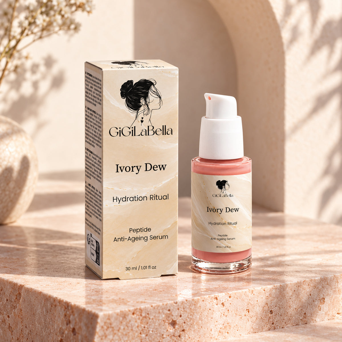 Ivory Dew 30 ml serum and matching carton on a blush stone pedestal