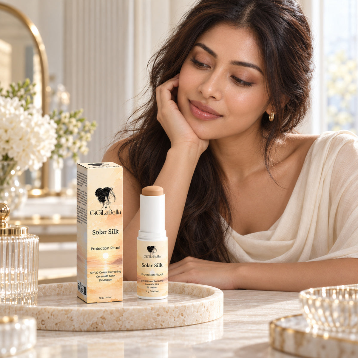 Solar Silk 25 Medium stick and carton on a luxury vanity with model