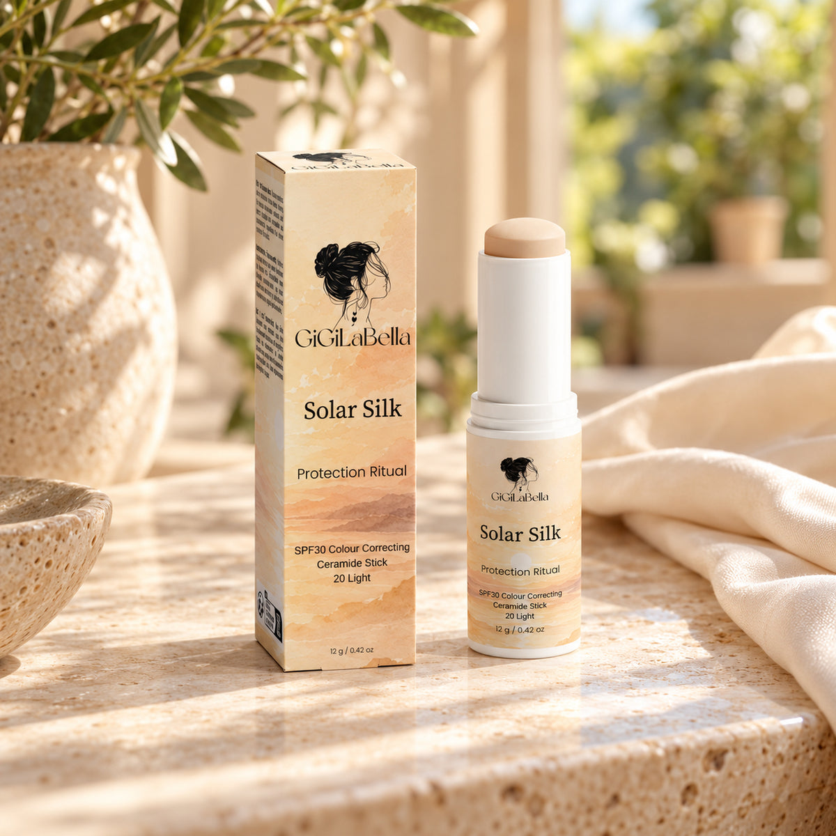 Solar Silk SPF30 colour-correcting ceramide stick in 20 Light with its illustrated carton on a sunlit limestone vanity